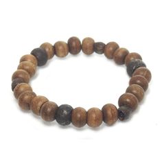 Tulsi Wood and Iron Bead Stretch Bracelet Size Approx. 7" Bead Size : 10 to 11mm Handcrafted at Beads of Paradise NYC Wooden Beads Rosary Bracelet For Meditation, Meditation Rosary Bracelet With Wooden Beads, Spiritual Rondelle Beaded Bracelet With Spacer Beads, Adjustable Stretch Bracelet With Large Beads For Meditation, Spiritual Rondelle Beaded Bracelets, Spiritual Beaded Rondelle Bracelets, Rondelle Beaded Bracelets For Healing, Adjustable Wooden Beads Bracelet, Meditation Beaded Rosary Bracelet