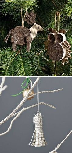 two ornaments are hanging from the branches of a tree and one is made out of paper