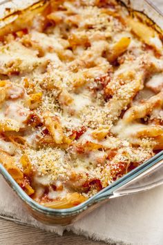 a casserole dish filled with pasta and cheese