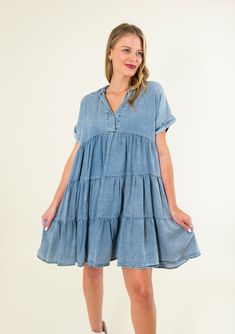 Short sleeves Side pockets Tiered Flowy fit Non-sheer 100% Tencel SIZES: SMALL MEDIUM LARGE Unleash your playful side in our Collared Washed Chambray Tiered Dress. With its medium and light denim options, this dress is perfect for any occasion. Tiered style adds a touch of whimsy, while the washed chambray material keeps you looking effortlessly cool. SIZE XS S M L XL 2XL 3XL FITS A SIZE 00-0 2-4 6-8 10-12 14-16 18-20 22-24 Trendy Medium Wash Short Sleeve Mini Dress, Trendy Medium Wash Mini Dress With Short Sleeves, Washed Blue Short Sleeve Dress With Pockets, Summer Denim Dress With Pockets, V-neck Denim Dresses With Pockets, Trendy Denim Blue Short Sleeve Dress, Trendy Short Sleeve Light Wash Mini Dress, Casual Short Sleeve Denim Mini Dress, Casual Short Sleeve Denim Blue Mini Dress