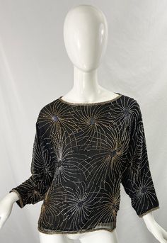 Halston 1970s Iconic Fireworks Beaded Black Silk Chiffon Vintage 70s Blouse Top For Sale at 1stDibs Disco Style Embellished Evening Tops, Disco Style Embellished Tops For Evening, Vintage Embellished Evening Blouse, Gold Embellished Evening Blouse, Gold Evening Blouse For Party Season, Vintage Festive Evening Tops, Festive Silk Sequin Top, Festive Silk Top With Sequins, Glamorous Silk Party Blouse