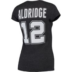 Celebrate your unwavering support for the San Antonio Spurs with the women's adidas LaMarcus Aldridge black San Antonio Spurs name and number T-shirt. Crafted from soft cotton, this T-shirt features bold graphics showcasing the iconic San Antonio Spurs logo and the legendary LaMarcus Aldridge's name and number. Whether you're cheering from the stands or representing your team off the court, this T-shirt is the perfect way to show your Spurs pride. Short sleeve Officially licensed Screen print gr Adidas Letter Print Tops For Sports Events, Adidas Tops With Letter Print For Sports Events, Adidas Crew Neck Activewear For Sports Events, Adidas Tops With Letter Print For Sports Season, Black Adidas Logo Top For Sports Events, Black Sports T-shirt With Number Print, Adidas Black Tops For Sports Events, Adidas Sportswear Tops With Letter Print, Sporty Number Print Tops For Fan Gear