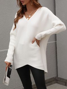 Our Clia Knit comes in an off white colour in an oversized drape fit. This features a heart neckline and open V back collar, batwing long fitted sleeves, and a roomy fit making this ideal for growing baby bumps. This piece is made from lightweight breathable material which is perfect for a trans-seasonal outfit. Pair with jeans for a lazy day outfit or complete the look with our Jady Rose Heels. Size Guide: Ambre is 5’2” tall, and has a 33.2” bust, 24.5”waist, & 36.7” hips. She is wearing a S / Rose Heels, Knitting Shirt, Leggings Boots, Solid Color Sweater, Gray Leggings, Color Sweater, Oversize Casual, Shirts Women Fashion, Sweater Women's