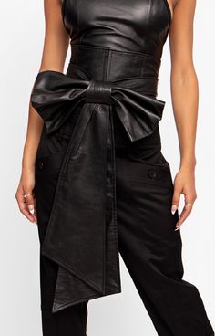 Inspired by and designed for the courageous dresser, our Oversized Bow Corset Belt cascades from waist to knee, creating a silhouette that is equal parts bold and playful. Team over a leather bodysuit for a sweet all-leather look, or slip over a dress for a night out. Back zip closure Lining: Silk 100 % lamb leather Made in Toronto This item is made-to-order in our Toronto studio and will be shipped within 2-3 weeks of purchase. We will follow up with you over email within 2 business days of you Romantic Encounter, Bow Corset, Leather Bodysuit, Bow Belt, Corset Belt, Leather Bow, Out Back, Leather Bows, Night Dress