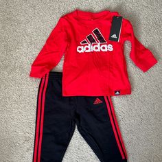 Size12 Month 2-Piece Set From Adidas. Classic Adidas Set For Your Little One. Brand New With Tags. Would Likely Fir 12-18 Infants/Toddlers. Red Cotton Sets For Fall, Adidas Cotton Sets For Winter, Adidas Cotton Winter Sets, Sporty Red Sets For Spring, Casual Red Cotton Sets, Red Cotton Fall Season Set, Casual Adidas Sets For Spring, Red Playtime Sets For Fall, Adidas Winter Sets With Long Sleeve