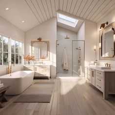 a large bathroom with two sinks and a bathtub next to a walk in shower