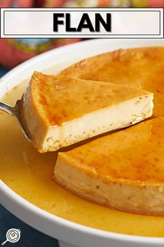 a close up of a pancake on a plate with a fork in the middle