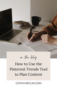 a person sitting at a desk with a laptop and notebook in front of them text reads, how to use the pinterest trend tool to plan content