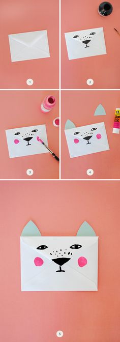 step by step instructions on how to make an envelope with a cat's face