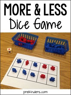 a dice game with the words more & less dice game next to it on a table