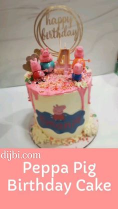 a birthday cake with peppa pig decorations on it