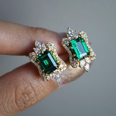 Read about our payment plans before proceeding.Inspired by Eleanor Young, the character from the top box office movie, "Crazy Rich Asian". Featuring a pair of stunning emerald surrounded by beautiful pear shape diamonds. These emerald earrings are an affirmation of self-worth and love. Available in 14k yellow gold, rose gold, and white gold. Choose between natural diamonds or CZ for the side stones. All orders come in our Tippy Taste ring box. Please note that all emeralds are natural, and may v Diamond Jewlery, Office Movie, Emerald Stud Earrings, Box Office Movie, Emerald Diamond Earrings, Crazy Rich, Emerald Earrings Studs, Rings Unique, Solid Gold Earrings