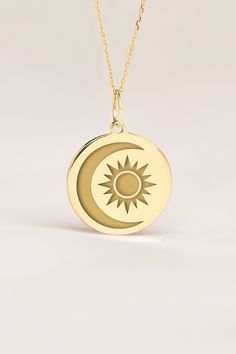 If you wish we can personalize your 14k Solid Gold Moon And Sun Necklace. A Dainty and unique gift for Birthdays, Graduations, Weddings and Anniversaries. ● MATERIAL 14k SOLID GOLD ● Chain Length or Without Chain - Without Chain - 40 cm / 16 inches - 45 cm / 18 inches - 50 cm / 20 inches ● PENDANT SIZE [The jump ring (bail) is not included in the measurements] - 13 mm / 0.51 Inches diameter - 14 mm / 0.55 Inches diameter - 15.3mm / 0.6 Inches diameter - 16.5mm / 0.65 Inches diameter - 19 mm / 0. Personalized Celestial 14k Gold Jewelry, Personalized Celestial Yellow Gold Jewelry, Personalized 14k Gold Celestial Jewelry, Celestial Personalized Yellow Gold Jewelry, Moon-shaped Yellow Gold Necklaces With Charms, Yellow Gold Moon Necklaces With Charms, Medallion Jewelry With Sun And Moon Design As Gift, Yellow Gold Moon-shaped Necklaces With Charms, Symbolic Yellow Gold Moon Jewelry