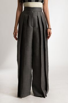 The Rosalie Pants are high-rise, wide leg trousers, crafted from a wool blend. The pants offer a flattering fit around the waist and hips. The look is finished with visible stitching detailing through the entire length of each pleat. ITEM DETAILS: - Two Front Pleats on Each Side - Side Button Closure - Hidden Front Zipper - Wide Leg Pant - Visible Pleat Hem Stitching  The model is 173cm high and wears size EU36/US4/UK8 MADE TO ORDER All our pieces are made to order only. We don't keep inventory, so every clothing piece we sell is made from scratch. As a clothing brand, we strongly believe that putting personalization before mass production is really important, as we want to build a sustainable brand that creates timeless clothing pieces you'll have in your wardrobe for years to come. When Visible Stitching, Single Breasted Blazer, Winter Trench Coat, Shirt Dress Casual, Pleated Pants, Breasted Blazer, Wool Pants, 4 Hours, Tailored Trousers