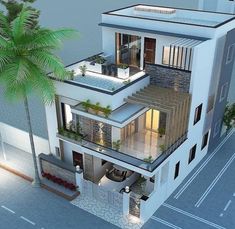 an aerial view of a two story house with balconies and palm trees in the foreground