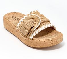 Slide into these summery sandals and enjoy the comfy feel and cute look. A raffia band with a buckle detail makes them ideal for those warm weather outings. From Earth Brands Footwear. Beige Footbed Sandals With Buckle Closure For Beach, Beige Buckle Footbed Sandals For Beach, Straw Sandals With Buckle Closure For Beach, Beige Buckle Closure Footbed Sandals For Beach, Beige Footbed Sandals With Buckle Closure For Vacation, Chic Footbed Sandals With Cork-bed Midsoles For The Beach, Summer Footbed Sandals With Buckle Closure, Summer Footbed Sandals With Buckle For Vacation, Summer Footbed Sandals With Buckle Closure For Vacation