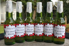 six green wine bottles with labels on them