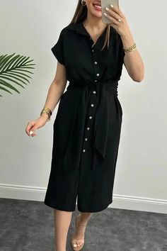 Details: Elasticity: Slight Stretch Sleeve Style: Regular Fabric Type: Polyester Neckline: Turn-down Collar Decoration: Button Size (IN) Bust Waist Hip Top Length S 31.10 32.68 N/A 44.49 M 32.68 34.25 N/A 44.88 L 34.25 35.83 N/A 45.28 XL 35.83 37.40 N/A 45.67 XXL 37.40 38.98 N/A 46.06 XXXL 38.98 40.55 N/A 46.46 Casual Button-up Office Dress, Casual Solid Color Shirt Dress For Work, Casual Buttoned Midi Shirt Dress, Casual Button-up Dress For Office, Casual Shirt Dress With Buttons For Workwear, Short Sleeve Solid Color Shirt Dress For Work, Casual Solid Color Shirt Dress For Office, Casual Solid Color Office Shirt Dress, Casual Office Dresses With Buttons