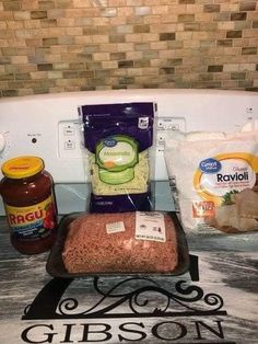 some food is sitting on top of a counter