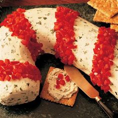 a platter with cheese and crackers on it