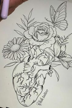 a drawing of a heart with flowers in it