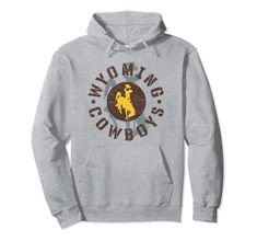 PRICES MAY VARY. Fan favorite Wyoming Cowboys apparel that is a great addition to any Wyoming fans wardrobe, making it a perfect gift for Christmas or graduation This Wyoming Apparel has a high quality digitally printed graphic perfect for any Cowboys fan that loves the classic design. Each shirt is officially licensed by University of Wyoming 8.5 oz, Classic fit, Twill-taped neck Cowboys Apparel, University Of Wyoming, Wyoming Cowboys, Cowboy Outfits, Gift For Christmas, Wyoming, Graphic Prints, Classic Design, Pullover Hoodie