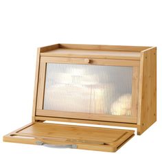 a small wooden box with a window inside