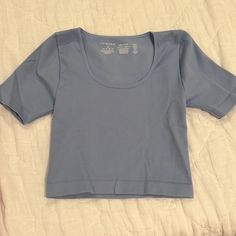 Nwot Super Soft And Comfy. Great For Working Out. Basic Stretch Blue Tops, Basic Blue Stretch Tops, Basic Blue Scoop Neck Top, Trendy Light Blue Seamless Tops, Everyday Blue Cropped Top, Light Blue Stretch Basic Top, Blue Stretch Seamless Tops, Blue Stretch Scoop Neck Top, Blue Cropped Seamless Top