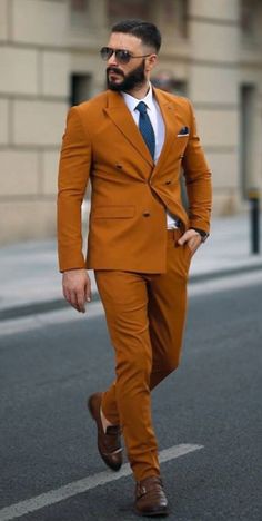 This unique wedding burnt-orange suit is designed with high quality wool material that guarantees durability and comfort. It is suitable for all kinds of occasion and it can be worn all year round. It comes in 2 pieces ( Breasted Jacket + pant) the blazer can also be worn with any kind of trouser or jeans  For custom orders, Please feel free to start a  conversation for further enquires. Your satisfaction is our priority Elegant Orange Notch Lapel Suits, Brown Blazer For Groom In Suiting Fabric, Brown Blazer For Grooms, Brown Groom's Blazer In Suiting Fabric, Classic Orange Suit With Notch Lapel, Orange Notch Lapel Suit For Work, Orange Formal Suit For Fall, Tailored Orange Blazer For Business, Orange Tailored Suit With Notch Lapel