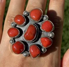 Navajo Native American Sterling Silver Red Coral Cluster Adjustable Ring. Width: 1.75 inch Artist: T Jon Best Offers Accepted! Southwestern Red Round Jewelry, Southwestern Style Round Red Jewelry, Handmade Southwestern Red Ring, Southwestern Style Red Ring Jewelry, Red Southwestern Style Collectible Jewelry, Unique Untreated Red Jewelry, Adjustable Southwestern Red Rings, Adjustable Southwestern Style Red Rings, Southwestern Style Red Turquoise Ring