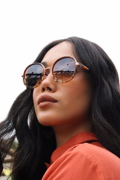 Introducing our Oval Ombre Tortoise sunglasses, where timeless design meets modern allure. These exquisite eyewear pieces are the embodiment of elegance, featuring distinctive tortoise frames that effortlessly merge classic aesthetics with contemporary fashion. The oval shape of the frames exudes an air of sophistication and versatility, making them an ideal choice for those who appreciate understated luxury. Crafted with meticulous attention to detail, the tortoise frames showcase a captivating Tortoiseshell Sunglasses With Tinted Lenses And Round Frame, Tortoiseshell Round Frame Sunglasses With Tinted Lenses, Tortoiseshell Sunglasses With Tinted Round Frame, Tortoiseshell Sunglasses With Tinted Round Lenses, Elegant Brown Sunglasses With Round Frame, Elegant Brown Round Frame Sunglasses, Elegant Tortoiseshell Sunglasses With Uv Protection, Chic Round Sunglasses With Gradient Lenses, Chic Brown Round Frame Sunglasses