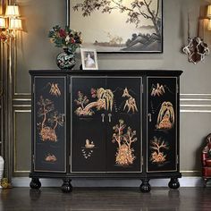 This black entryway cabinet, adorned with intricate hand-painted relief artistry, brings an added touch of dynamic elegance to any space. The well-crafted lines are both beautiful and fluid, enriching the cabinet with a distinct vintage charm. DineElegance. r | DineElegance.r Entrance cabinet side cabinet decorative cabinet / brown / gray / yellowWood in Black | 37" H X 47.24" W X 14.17" D | Wayfair Black Entryway, Entrance Cabinet, Freestanding Storage Cabinet, Entryway Cabinet, Freestanding Storage, Accent Chests And Cabinets, Decorative Cabinet, Asian Homes, Cabinet Black