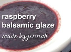 raspberry balsamic glaze in a white bowl with text overlay