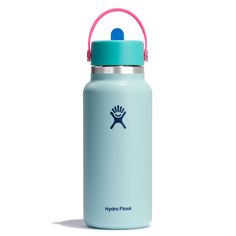 the hydro flask water bottle is blue and has a pink rubber band around it