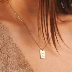 TRENDY RECTANGLE NECKLACE FOR MOM Elegant, simple, and classy never goes out of style! Treat mother to something exceptional: Trendy rectangle necklace for mom. This necklace features a unique hand-drawn heart pattern with mom word on the top. CHARACTER LIMIT Max 10 letters per name ITEM SPECIFICATIONS • Finish: 18K Gold ∙ 925 Sterling Silver ∙ Rose Gold• Dimensions: Adjustable Length Chain 15” | Pendant 12x18mm Everyday Necklace With Rectangular Pendant, Meaningful Rectangular Necklaces For Gifts, Meaningful Rectangular Necklace For Gift, Meaningful Gift Necklace, Meaningful Rectangular Jewelry For Everyday Use, Meaningful Everyday Rectangular Jewelry, Rectangular Charm Necklaces For Everyday, Minimalist Rectangular Jewelry For Valentine's Day, Minimalist Rectangular Valentine's Day Jewelry