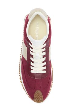 A grippy sole brings sporty appeal to a contemporary sneaker fashioned with contrasting textured panels. Synthetic and textile upper/textile lining/synthetic sole Imported Sporty Burgundy Sneakers With Rubber Sole, Sporty Burgundy Low-top Sneakers, Burgundy Low-top Sneakers With Rubber Sole, Burgundy Leather Sneakers For Sports, Sporty Burgundy High-top Sneakers, Burgundy Sporty Sneakers For Sports, Sporty Burgundy Sneakers For Sports, Sporty Burgundy Sneakers, Burgundy Lace-up Sneakers For Sports