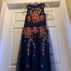 Simplee Apparel Size Large Back Zipper Blue Tulle Layers 60” Total Length Arm Pit To Arm Pit 16” Blue Floral Embroidery Dress For Wedding, Blue Floral Embroidery Wedding Dress, Fitted Blue Gown With Floral Embroidery, Blue Tulle Wedding Gown, Blue Floral Embroidered Dress For Wedding Guest, Blue Floral Embroidered Prom Dress, Blue Tulle Dress For Prom Season, Blue Ball Gown Dress With Tulle Skirt, Blue Prom Dress With Floral Embroidery