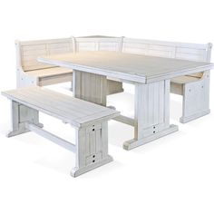 a white table and bench with two benches