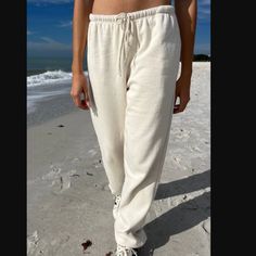 Brandy Melville Rosa Tie Sweatpants In Creme Color , Brand New With Tags, No Stains Holes Or Issues. All 1 Size. White Relaxed Fit Pants For Beach Season, White Loungewear Pants For Beach Season, White Beach Season Loungewear Pants, White Beach Loungewear Pants, White Beach Season Lounge Pants, Casual Cream Pants For Vacation, Cream Cotton Bottoms For Beach Season, Casual Cream Pants For The Beach, Brandy Melville Cargo Pants