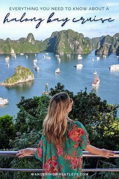 a woman standing on top of a balcony looking at boats in the water