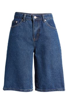 An oversized silhouette and low rise amplify the trend-savvy appeal of denim Bermuda shorts rendered in a classic blue wash. 100% cotton Machine wash, dry flat Imported Long Jorts Women, Bermuda Aesthetic, Long Jean Shorts Outfit, Baggy Shorts Women, Jean Shorts Long, Jorts Women, Football Casual Clothing, Bermuda Shorts Outfit, Baggy Jean Shorts