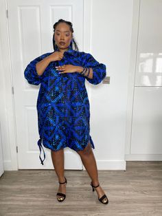 * Beautiful handmade Ankara shirt dress with side pockets. *  Dress has a full front zip  down, side pockets and a self tie belt. *  Dress has a high low design to the dress hem that can be adjusted. A copy of our size chat has  been added to photo collage, please check your size before placing your order, as we will not be responsible for incorrect sizes. If you have any inquiries, please feel free to start an etsy conversation CARE INSTRUCTIONS *Hand wash with warm water. *Do not bleach. *Allo Blue Long Sleeve Ankara Dress, Ankara Shirt Dress, Dress With Front Zipper, Ankara Shirt, Dress African Print, Dress Shirt Dress, Dress Ankara, African Print Dress Ankara, Dress African