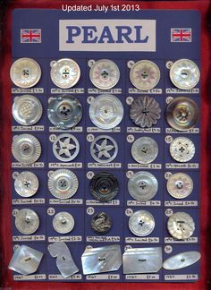 a display case filled with lots of different types of metal buttons and magnets on top of each other