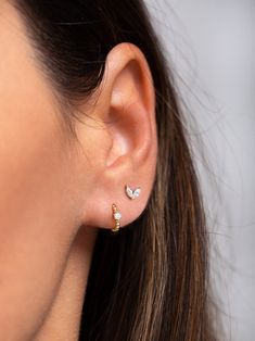 "Dainty and elegant, these beaded small hoops feature a tiny cubic zirconia gemstone and look gorgeous layered with other earrings. Can also be worn on a cartilage/helix piercing. ∙ Sold individually (1 earring) or as a pair (2 earrings) * D E T A I L S * ∙ Material: .925 Sterling Silver or 18K Gold Plated over .925 Sterling Silver ∙ Diameter: 11mm ∙ Hypoallergenic & nickel-free * P A C K A G I N G * ∙ All jewelry is sent out beautifully packaged in our signature box & ready for gifting. Dainty Adjustable Silver Huggie Earrings, Adjustable Dainty Huggie Earrings, 2 Hole Ear Piercing Earrings, Silver 14k Gold Pierced Huggie Earrings, Silver Gold-plated Huggie Cartilage Earrings, Gold-tone Small Hoop Huggie Earrings, Upper Ear Earrings, Turquoise Earrings Gold, Second Ear Piercing