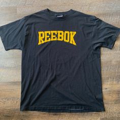 There Is No Dry Rot, This Truly A Gem. Please See All Photos For More Detail. Thanks For Looking! Retro Black T-shirt For College, Black Collegiate T-shirt For Streetwear, Flag Tag, Stitch Tshirt, Reebok Black, British Flag, True Vintage, Black Tee, Men's T Shirt