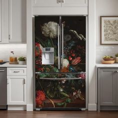 a refrigerator with flowers painted on it in a kitchen