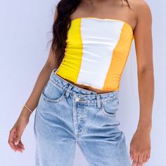 This Head Turner Tube Top Has A Paneled Colorblock Design With Exposed Seams And A Cropped Fit. Brand New And Never Worn But Was Taken Out Of Original Packaging. Color: Orange/White/Yellow Size: Medium Stretch Knit Fabrication Rayon/Poly/Stretch Blend Model Is Wearing Size Small 87% Polyester/13% Elastane Fitted Yellow Sleeveless Tube Top, Solid Color Crop Tube Top With Built-in Bra, Orange Bandeau Top, Orange Tube Top, Forever 21 Trendy Yellow Crop Top, Orange Yellow, Cropped Tube Top, Tube Top, Yellow White