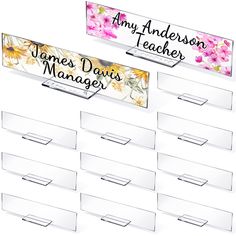 several clear acrylic name tags with flowers on them