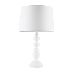 a white lamp with a white shade on it