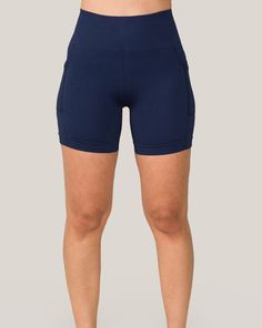 Offering a complete range of motion and reliable seamless support, these flattering navy seamless pocket shorts for women will inspire you to go far. This style of navy seamless pocket shorts runs small. Please consider sizing up. Seamless 4-way Stretch Shorts, Navy Activewear With Built-in Shorts For Gym, Navy Stretch Athleisure Shorts, Navy Stretchable Training Shorts, Navy Stretch Training Shorts, Navy Stretch Athletic Shorts For Workout, Navy Athleisure Activewear With Built-in Shorts, Navy Athleisure Activewear, Short Length, Navy Activewear With Built-in Shorts For Training